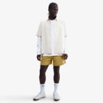 شورت زرد مردانه نایک Club Flow - تصویر 34